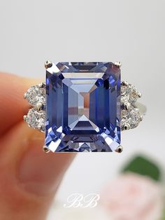 an image of a blue and white diamond ring