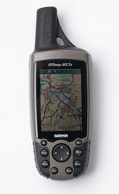 a cell phone with a gps device attached to it's back end, on a white surface