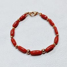 Bracelet Italian Coral Bracelet, 100% Natural Italian Red Coral Bracelet, Red Coral Handmade Charming Bracelet, Coral Smooth Beads Bracelet... Gemstone : Natural Red Coral  Bracelet Weight : 33.20 Carat   Bracelet Length;- 7 Inches  Color : As Seen In Picture Payment policy We accept the payment via PayPal only. Shipping policy We Ship the item as per our shipping policy once we receive the payment. We understand that getting your items quickly is important to you, so we make every effort to process your orders quickly. Return policy We accept the return within 7 days and item should be return in original condition without any damage and broken. We are continuously adding new products in our shop. So keep coming back to see more great deals on jewelry in our mart For Wholesale orders or cu Red Coral Bracelets With Polished Beads As A Gift, Red Coral Bracelet With Polished Beads As A Gift, Red Coral Bracelets As A Gift, Red Coral Bracelets For Gift, Red Gold Jubilee Bracelet For Gift, Red Jubilee Gold Bracelet Gift, Elegant Red Round Bead Bracelets, Red Bangle Gold Bracelet As Gift, Elegant Red Beaded Bangle Bracelet