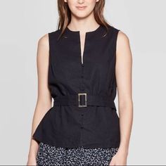 Make A Modern Power Move In The Sleeveless Belted Top From Who What Wear. Softly Structured From Breathable Cotton Linen, This Sleeveless, Collarless Shirt Balances Clean, Strong Lines With A Waist-Defining Built-In Belt To Enhance The Figure. Pair This Workwear Essential Back To A Well-Tailored Trouser, Or Wear It With A Flowing, Feminine Skirt For A Chic Study In Contrast. Brand New! Fast Shipping! Chic Cotton Tank Top With Buttons, Cotton Tank Top With Button Closure For Work, Black Buttoned Summer Vest, Black Buttoned Vest For Summer, Casual Black Tank Top With Button Closure, Black Tank Top For Workwear In Spring, Black Casual Buttoned Tank Top, Casual Black Buttoned Tank Top, Sleeveless Buttoned Tank Top For Work