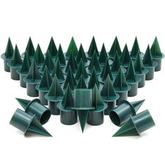 a group of green plastic cones on top of each other