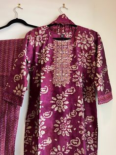 3 pc Maroon Purple Gold Floral Suit women clothing. This 3 pc Maroon Purple Gold Floral Suit is the perfect way to make a statement. The sophisticated purple 3 pc set contains a long-sleeved top, trousers, and a matching dupatta . creating an elegant look that stands out from the crowd. Semi-stitched Purple Palazzo Set, Festive Purple Palazzo Set With Long Sleeves, Festive Purple Long Sleeve Palazzo Set, Purple Long Sleeve Palazzo Set For Festive Occasion, Festive Long Sleeve Purple Palazzo Set, Festive Purple Cotton Palazzo Set, Elegant Purple Cotton Sets, Fitted Purple Palazzo Set With Zari Work, Purple Cotton Kurta With Dupatta