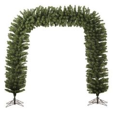 an arch made out of branches with two trees on each side and one tree in the middle