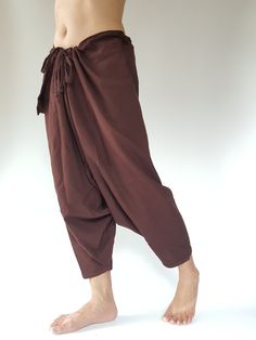 "⬇️ SHOP HERE https://www.etsy.com/ch-en/shop/IndycraftsDesigns Aladdin Pants, Harem Pants 100% Cotton Unisex pants, perfect for yoga, The fabric is cotton soft, lightweight, and airy, ideal for those warm days. If it's a bit chilly, you could always wear leggings underneath. super comfortable cotton pants made of light, comfortable to wear 100% cotton. Cotton is a natural material that wicks moisture to keep you cool, comfy & dry. Floral printed, elastic waistband,medium-weight, Soft and Co Brown Cotton Ankle-length Harem Pants, Brown Baggy Tapered Leg Harem Pants, Brown Harem Pants With Loose Fit, Baggy Brown Bohemian Bottoms, Traditional Brown Bottoms For Summer, Baggy Brown Festival Pants, Bohemian Baggy Brown Bottoms, Brown Harem Bottoms With Pockets, Brown Baggy Bohemian Bottoms