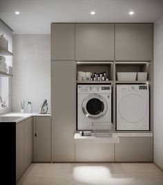 a washer and dryer in a small room