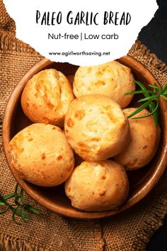 homemade palen garlic bread in a bowl with rosemary sprigs on the side