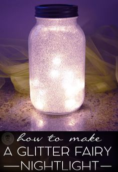 a mason jar with fairy lights in it and the words how to make a glitter fairy nightlight