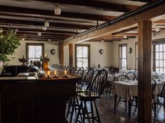 a dining room filled with lots of tables and chairs