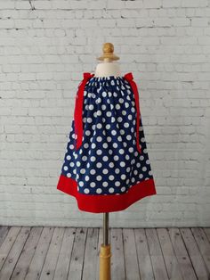 This red, white and blue patriotic dress is perfect for so many holidays or just a cute dress for every day. All dresses are made in my smoke free, pet free studio. Machine wash and tumble dry. For the fit, measure from the shoulder to the desired length. 12 Month - 15 inches 18 Month - 16 inches 2 Toddler - 17 inches 3 Toddler - 18 inches 4 Toddler - 19 inches 5 Toddler - 20 inches 6 Girls - 21 inches 7 Girls - 22 inches Ole Miss Girls, Patriotic Costumes, Minnie Mouse Skirt, Anchor Dress, 4th Of July Dresses, Patriotic Dresses, Gameday Dress, Nautical Dress, Girls 21st