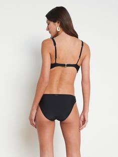 A summer essential has arrived in classic black. In a four-way stretch nylon that offers complete freedom of movement, our Nicole bikini bottom features moderate coverage for a secure fit. Pair with one of our coordinating bikini tops for long days at the beach. | L'AGENCE Nicole Bikini Bottom In Black Beachwear Triangle Top Swimwear With Smoothing, Triangle Top Swimwear With Smoothing Feature For Beachwear, Triangle Top Smoothing Swimwear For Beachwear, Sleek Nylon Swimwear With Built-in Bra, Sleek Swimwear With Built-in Bra For Beach, Triangle Top Smoothing Swimwear, Sleek Seamless Swimwear For Beach, Sleek Seamless Beach Swimwear, Black Swimwear With Moderate Back Coverage For Beach Season