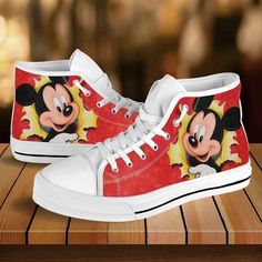 Classic Minnie Mouse Disney Cartoon High Top Shoes Sporty Top Sneakers High-top canvas shoes exude a unique blend of casual comfort and trendy fashion. These iconic shoes feature a high-rise design that wraps the ankle, providing exceptional support and style. Crafted from breathable and lightweight canvas material, they offer comfort and flexibility for everyday wear. Their versatile nature effortlessly transitions from laid-back outings to trendy urban styles, allowing for easy pairing with va Casual Mickey Mouse Lace-up Sneakers, Casual White Sneakers With Character Print, Casual Cartoon Print Sneakers For Streetwear, Casual Low-top Sneakers With Character Print, Disney Character Print Sneakers With Round Toe, Casual High-top Mickey Mouse Sneakers, Casual Low-top Mickey Mouse Sneakers, Casual Canvas Ankle-high High-top Sneakers, Disney Round Toe Sneakers For Streetwear