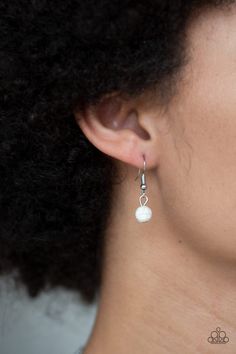 A collection of round and teardrop white stone beads and decorative silver teardrops swing from the bottom of double-link silver chain, creating an earthy fringe below the collar. Features an adjustable clasp closure. Sold as one individual necklace. Includes one pair of matching earrings.