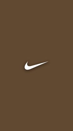 a white nike logo on a brown background