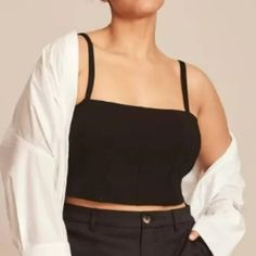 11 Honor Collection Shayla Black Crop Top Plus Size 3 / 22-24 Condition: Brand New Without Tags; No Flaws Size: Women's Plus Size 3 Which Is A Us 22-24 Retail Price: $98.00 Color: Black Material: Blended Fabric With Good Amount Of Stretch This Cropped, Built-In Shelf Bra Tank Has Contoured Seam Details And Adjustable Straps. Since It’s Cut From A Stretchy Ponte Fabric, It’s Super Comfortable. Wear As A Layering Piece Or Go Bold By Wearing Alone. A Sleeveless Plus Size Top To Transform Your Workw Black Top With Built-in Bra For Day Out, Black Tops With Built-in Bra For Day Out, Crop Top Plus Size, Bra Tank, Top Plus Size, Black Crop Top, Plus Size Top, Woven Top, Shelf Bra