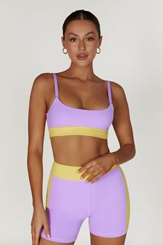 Race you to the top. Our BECCA Two Tone Cropped Sports Bra is designed with a cropped length, fully-lined, bodycon fit, wide straps and the option to remove the bust cups, making it a perfect choice for high impact sports or simply supportive for lounging. We’ve also incorporated our silicone MESHKI logo detailing throughout and our ultra soft FLEXI Butter fabrication for a supportive fit. Everyone at HQ is pairing this with our Alexandra Oversized Button Up Shirt and Taleah Two Tone Shorts to c Sports Crop Top With Adjustable Straps, Yellow Crop Top With Built-in Bra, Sporty Crop Top With Adjustable Straps And Scoop Neck, Fitted Sporty Crop Top With Wide Straps, Sporty Cropped Tops With Adjustable Straps, Sporty Crop Top With Adjustable Straps And Medium Support, Sporty Crop Top With Medium Bust Support For Summer, Sporty Crop Top With Built-in Bra And Wide Straps, Sporty Crop Top With Bra Friendly Wide Straps