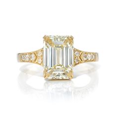 3.01ct O-P/VS2 GIA certified Emerald cut diamond with 0.07ctw Old European cut accent diamonds set in a handcrafted 18K yellow gold mounting. Rare Diamonds, Emerald Cut Diamond Ring, Emerald Cut Diamond, Single Stone, Modern Ring, Antique Diamond, Emerald Cut Diamonds, Engagement Rings Sapphire, Conflict Free Diamonds