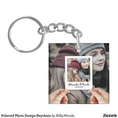 a person holding up a keychain with a photo on it and the words polaroid