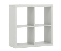 a white shelf unit with four sections