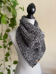 "This bandanna cowl has a chunky look to it and is great for someone who wants to stay warm without the length of a regular or infinity scarf.  It is so soft and has a beautiful stitch pattern.  This versatile accessory will enhance any wardrobe.   The approximate measurements flat are 17\"H  x  13\"W  This bandanna cowl was hand knit with a super bulky yarn.  The color is Licorice. This yarn is machine washable and dryable, 80% acrylic and 20% wool Custom orders are welcome please convo me with your request. Each of my handmade creations are made in a smoke free and pet friendly environment." Casual Yarn Infinity Scarf For Winter, Warm Cozy Scarves One Size, Winter Loop Yarn Scarves, Cozy Loop Scarves One Size, Handmade Casual Winter Infinity Scarf, Warm Infinity Scarf For Cold Weather, One Size, Warm Infinity Scarf For Cold Weather, Warm One-size Infinity Scarf For Cold Weather, One Size Loop Scarves For Winter