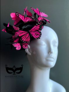 This elegant pink butterfly women's fascinator makes the perfect holiday gift! Featuring monarch butterflies in a variety of colors on a black fascinator base and headband/clip option. You have the option to pick other colors listed or a mix color option!   I N C L U D E D Black fascinator on headband base topped with high-quality intricately detailed butterflies.  In secure box packaging to keep form.  S H I P P I N G -  Processed same day or within 24 hours.  1-2 day guaranteed delivery, add i Spring Fascinator For A Gift, Spring Fascinator As Gift, Pink Hat Fascinator As Gift, Spring Pink Fascinator As A Gift, Spring Pink Fascinator For Gift, Whimsical Summer Evening Costume Hats And Headpieces, Spring Pink Fascinator As Gift, Whimsical Evening Headpieces For Spring, Pink Costume Hats And Headpieces For Carnival Evening