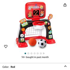 a red and black toy with a soccer ball on it