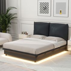 a bed that is sitting in the middle of a room with white walls and flooring