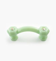 a green handle on a white background