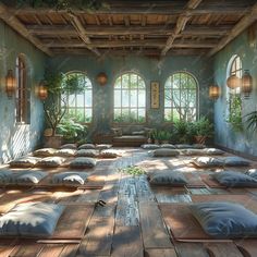 a room filled with lots of pillows on top of wooden flooring next to windows