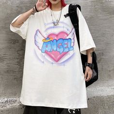 Angel Heart Wings Print Oversize T-shirt on Storenvy Oversized Tops With Heart Graphic For Streetwear, Oversized Heart Graphic T-shirt For Streetwear, Angel Sleeve Shirt, Pink Heart Graphic T-shirt For Streetwear, Heart-shaped Graphic Print T-shirt For Streetwear, Angel Heart, Tony Moly, Heart With Wings, Tee Dress