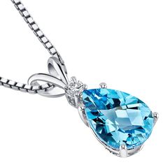 Turn some heads: This stunning Lagoon Blue Hue Swiss Blue Topaz Pendant are a true color statement. Polished 14 Karat White Gold makes it easy to wear. Style P8948 Blue Topaz Jewelry, Blue Topaz Pendant, Fancy Gifts, Topaz Pendant, Blue Topaz Stone, Zircon Jewelry, Swiss Blue Topaz, December Birthstone, Oval Pendant