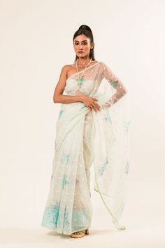 Explore the elegance of our White Organza Saree with floral embroidery. Perfect for any event, it combines comfort with style, ensuring you look and feel regal. Spring Tissue Silk Sets With Resham Embroidery, Organza Blouse Piece With Floral Embroidery For Reception, Spring Silk Traditional Wear With Sheer Dupatta, Spring Traditional Wear With Sheer Dupatta And Silk, Traditional Tissue Silk Sets For Spring, Organza Saree With Floral Embroidery For Reception, Reception Organza Saree With Floral Embroidery, Spring Silk Traditional Wear With Zari Work, Chanderi Traditional Wear With Floral Embroidery For Reception