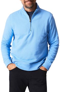 A cotton-rich knit brings cool-weather comfort to a pullover styled with a stand collar and a half-zip to adjust the fit. 26 1/2" length (size Medium) Half-zip closure Long sleeves Ribbed cuffs and hem 97% cotton, 3% polyester Machine wash, tumble dry Made in Peru Blue Cotton Top With Zipper Closure, Blue Cotton Tops With Zipper Closure, Casual Blue Half-zip Sweater, Blue Half-zip Sweatshirt With Ribbed Cuffs, Cotton Half-zip Sweatshirt With Zipper Closure, Cotton Half-zip Sweatshirt With Zipper, Blue Half-zip Sweater, Blue Half-zip Tops With Ribbed Cuffs, Blue Cotton Sweatshirt With Zipper Closure