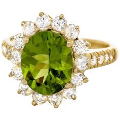 5.15 Carats Impressive Natural Peridot and Diamond 14K Yellow Gold Ring Total Natural Peridot Weight is: Approx. 4.00 Carats Peridot Measures: Approx. 11.00 x 9.00mm Natural Round Diamonds Weight: Approx. 1.15 Carats (color G-H / Clarity SI1-SI2) Ring size: 7 (we offer free re-sizing upon request) Ring total weight: Approx. 5.7 grams Disclaimer: all weights, measurements and colors are approximate and may vary slightly from the listed dimensions or as seen in the image. All pictures are magnifie Peridot Engagement Rings, Wedding Ring For Her, Promise Ring Gift, Emerald Cut Rings, Birthday Ring, Etsy Gold Ring, Peridot Ring, Rings For Girls, Yellow Gold Ring