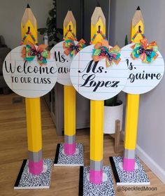 three yellow pencils with signs on them that say, welcome to our class and mr and mrs