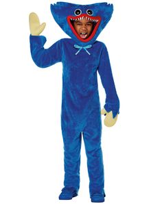 a person in a blue shark costume with one hand up and the other thumb down