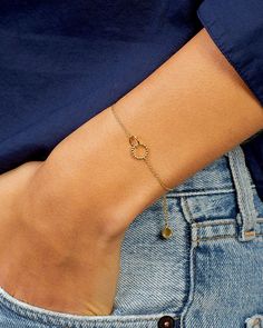 Crafted with luxe gold plating, this Crew Charm Bracelet is an elegant addition to any look. Featuring interlocking rings, this bracelet is dainty yet adjustable for any wrist size. A timeless design, this bracelet is the perfect accessory for any occasion. Crew Bracelet, 18k Gold, Women's by gorjana Adjustable Delicate Yellow Gold Chain Bracelet, Elegant Heart Bracelet With Adjustable Chain, Adjustable Yellow Gold Minimalist Heart Bracelet, Adjustable Minimalist Yellow Gold Heart Bracelet, Adjustable Tarnish Resistant Yellow Gold Heart Bracelet, Chic Adjustable Yellow Gold Bracelet, Adjustable Minimalist Gold Heart Bracelet, Minimalist Adjustable Gold Heart Bracelet, Gold Minimalist Adjustable Heart Bracelet