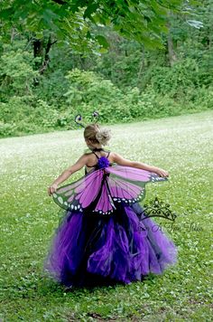 "Rainbow Monarch Butterfly Tutu Dress Set This gorgeous colorful rainbow tutu mixed with black tulle on an unlined black crochet top! Wings and antenna headband are included with this tutu dress. Wear with a butterfly Halloween costume, use a photo prop, birthday party outfit, or just for play! Wings and hair clip can be added through the drop down menu. Adult size is made as the skirt only. Full dresses are not available in adult size. Please note - wing size remains the same no matter what siz Rainbow Butterfly Costume, Toddler Butterfly Costume Diy, Butterfly Dress Kids, Toddler Halloween Costumes Girl, Kids Fairy Costume, Girls Halloween Costumes For Kids, Halloween Costumes Children, Butterfly Fairy Costume, Toddler Butterfly Costume