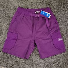 Adidas Purple Cargo Shorts Nwt Size Medium Great Royal Purple Color 9" Inseam 14.5" Waist (Elastic Sinch Cargo Belt Waist) Purple Nike Shorts Men, Adidas Cotton Bottoms With Built-in Shorts, Adidas Athletic Shorts For Streetwear, Adidas Athletic Cotton Shorts With Built-in Shorts, Adidas Cotton Athletic Shorts For Spring, Adidas Shorts For Spring Streetwear, Adidas Spring Streetwear Shorts, Adidas Bottoms With Side Pockets For Streetwear, Adidas Bottoms With Built-in Shorts For Streetwear