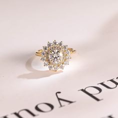 a close up of a ring on top of a paper with the word, no 4 pure written in it