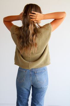 Stay cozy in this best-selling Prague Mock Neck Top! Crafted with organic cotton, it features a slouchy fit with a pocket. Its olive hue will be a stylish addition to your wardrobe. Experience this highly awaited restock—get yours now! How to style: Pair with your favorite pair of jeans for a relaxed yet cool girl vibe. About the product Olive in color Slouchy fit Pocket Mock Neck Knitted material 100% cotton Oversized Olive Top For Fall, Green Relaxed Fit Sweater With Pockets, Green Sweater With Pockets Relaxed Fit, Khaki Tops For Fall Loungewear, Relaxed Fit Khaki Sweater For Fall, Oversized Olive Cotton Top, Green Cozy Top With Relaxed Fit, Green Cozy Relaxed Fit Top, Green Relaxed Fit Cozy Top