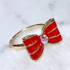 Brand New Gold Tone Bow Ring In Red. Adjustable Size. Cute Red Round Jewelry, Cute Round Red Jewelry, Trendy Red Party Rings, Cute Adjustable Rings For Parties, Cute Adjustable Party Rings, Adjustable Cute Party Rings, Cute Party Ring Jewelry, Cute Red Ring As Gift, Cute Red Ring For Gift