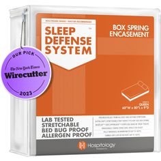 the box spring encasement for sleep defense system is shown in orange and white