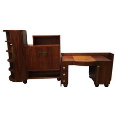 three pieces of art deco furniture including a desk and chair