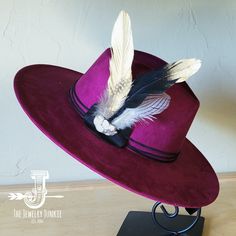 If you’re looking for the perfect accessory to complement your favorite boho style, look no further. This Boho-Style Western Felt Hat w/ Natural Feather & Turquoise Hat Accent by The Jewelry Junkie is absolutely everything that you need. Not only is it easy to incorporate into any and all outfits, but the genuine leather and natural feathers of the band immediately elevate whatever it is you’re wearing. One Size Hat with adjustable inner hat liner (see last photos) The same primary feathers will Bohemian Felt Hat For Festival, Fitted Bohemian Felt Hat For Festival, Bohemian Fitted Fedora Hat, Fitted Bohemian Fedora Hat, Bohemian Wide Brim Fitted Hat, Bohemian Hat Bands With Flat Brim, Bohemian Flat Brim Fitted Hat Bands, Bohemian Fitted Fedora With Short Brim, Fitted Bohemian Brimmed Fedora