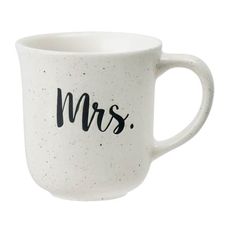 a white coffee mug with the word mrs printed on it