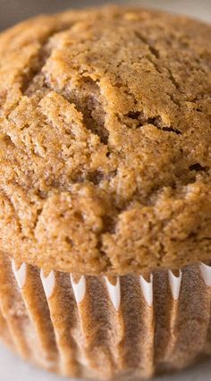 a muffin sitting on top of a white plate