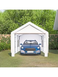 a blue car is parked in a white carport with the door open to reveal it's interior