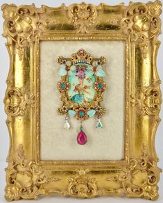 Easily interchangeable, this MARIE ANTOINETTE Necklace/Brooch in Pretty Pastel Colours is a Framed Portrait under Resin with a Jewelled Crown on top, Handmade Glass Flowers, Vintage Swarovski Rhinestone Flowers, CZECH Iridescent glass leaves and Drops.   She is adorned with flowers, bows, Necklace and Fleur de Lis embedded within the resin.  The Gold plated decorative chain has Hand-made Lampwork beads, Rose Beads and Fancy Gold Beads and a 6cm extender. Artistic Wedding Jewelry Brooch, Artistic Wedding Brooch Jewelry, Artistic Wedding Jewelry With Brooch, Swarovski Flowers, Marie Antoinette Portrait, Framed Portrait, Rose Beads, Portrait Necklace, Crown Vintage