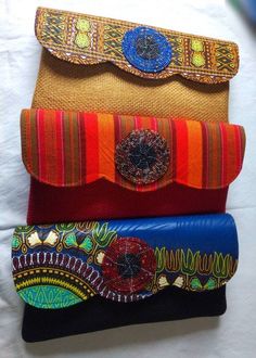 African çlutch bags,African print bag, purses, women purses.They are made out of Masai shuka and jute materialThey are fabulous way to bring taste to any outfit.Perfect christmas gift for loved ones. Ship via dhl express.Thank you for stopping by. Multicolor Clutch Bag For Gift, Handmade Envelope Clutch As Gift, Handmade Envelope Clutch For Gift, Multicolor Clutch Shoulder Bag Gift, Handmade Red Clutch As Gift, Handmade Red Clutch For Gift, Handmade Red Clutch Perfect For Gift, Handmade Pouch As Gift, Envelope Bag For Gifts