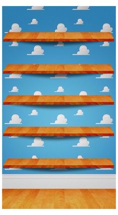 an empty room with wooden shelves and clouds on the wall in front of blue background